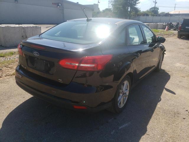 Photo 4 from auction – 2016 FORD FOCUS SE with VIN 1FADP3F23GL271561