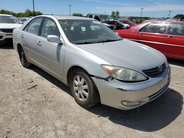 TOYOTA CAMRY LE 2004 with VIN 4T1BF30K64U587616 - Photo from auction
