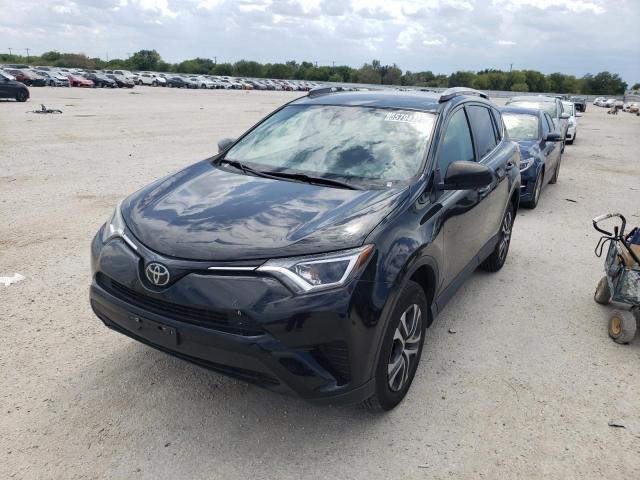 Photo 2 from auction – 2018 TOYOTA RAV4 LE with VIN 2T3BFREV7JW816023