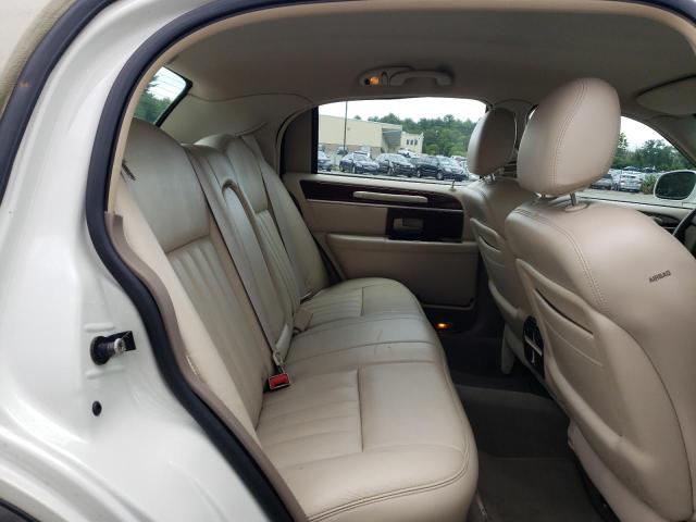Photo 6 from auction – 2004 LINCOLN TOWN CAR E with VIN 1LNHM81W04Y680526