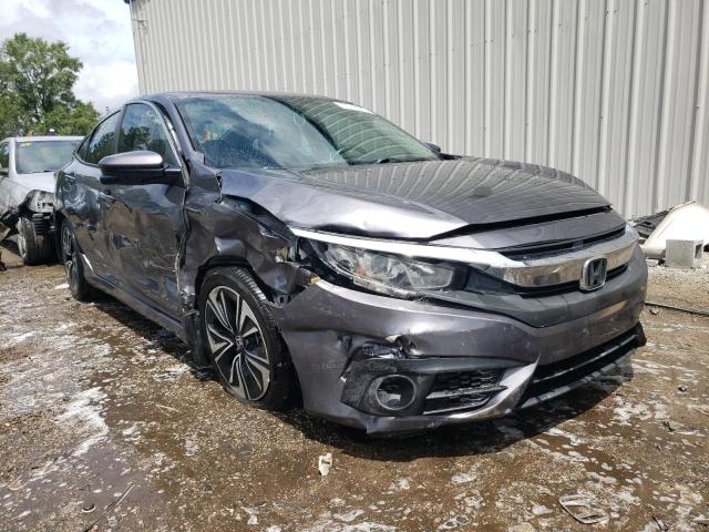 Photo 9 from auction – 2018 HONDA CIVIC with VIN 2HGFC1E39JH646663