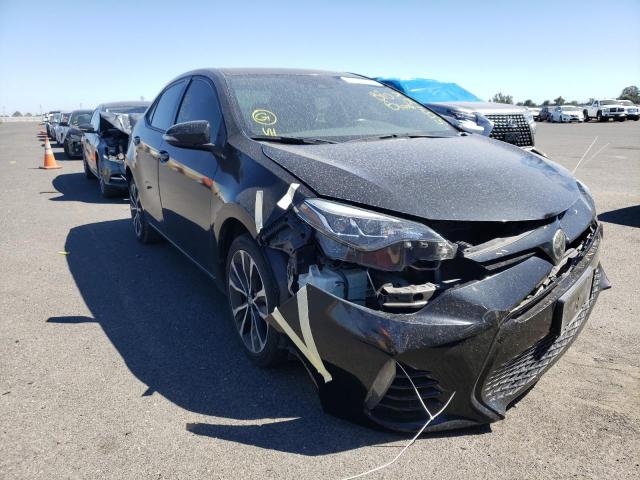 TOYOTA COROLLA L 2017 with VIN 5YFBURHE9HP657012 - Photo from auction