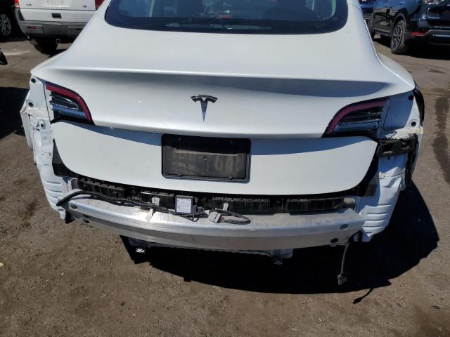 Photo 9 from auction – 2021 TESLA MODEL 3 with VIN 5YJ3E1EA0MF088688