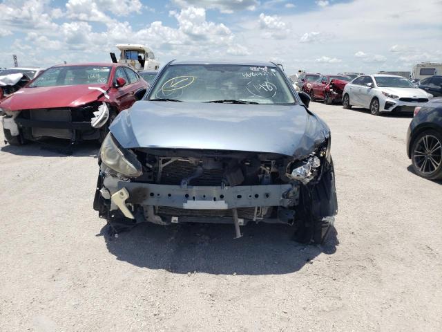 Photo 9 from auction – 2015 MAZDA 3 SV with VIN JM1BM1T73F1249181