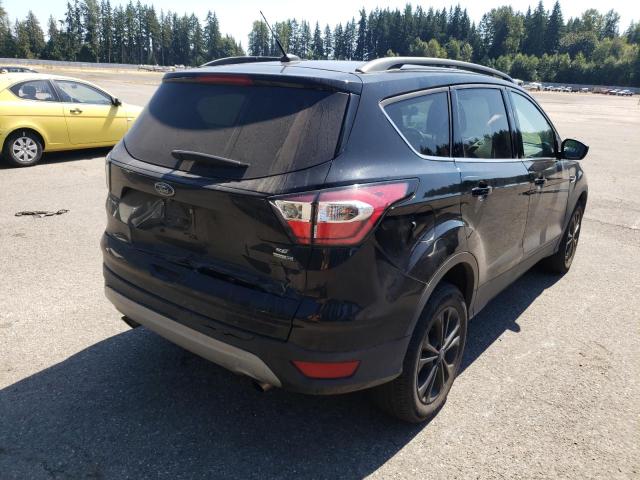 Photo 4 from auction – 2017 FORD ESCAPE SE with VIN 1FMCU9G95HUD96114