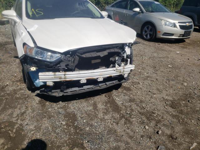 Photo 9 from auction – 2015 FORD FUSION SE with VIN 3FA6P0LU4FR123884