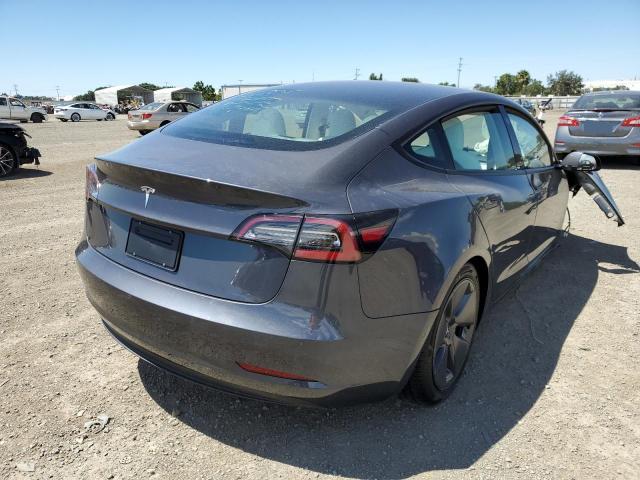 Photo 4 from auction – 2022 TESLA MODEL 3 with VIN 5YJ3E1EA6NF331177