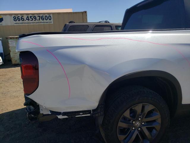 Photo 9 from auction – 2021 HONDA RIDGELINE with VIN 5FPYK3F18MB021904
