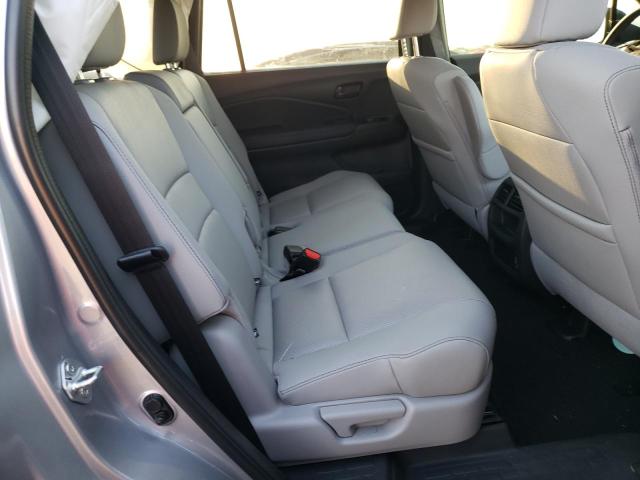 Photo 6 from auction – 2022 HONDA PASSPORT E with VIN 5FNYF7H51NB001242