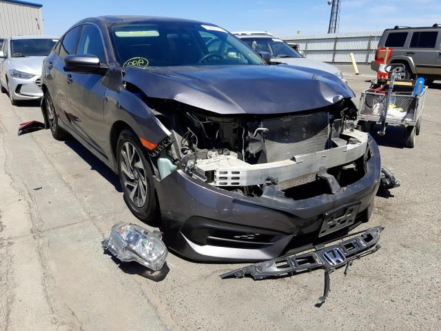 HONDA CIVIC EX 2018 with VIN 2HGFC2F72JH503805 - Photo from auction