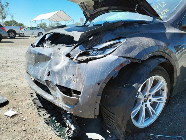 Photo 9 from auction – 2021 TESLA MODEL Y with VIN 5YJYGDEE9MF203857