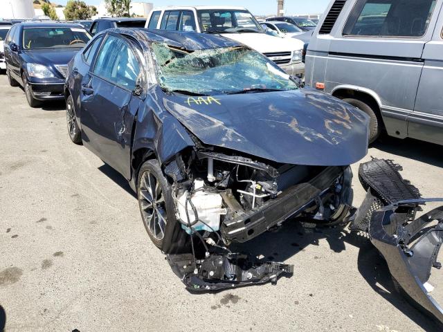 TOYOTA COROLLA L 2019 with VIN 5YFBURHE3KP857164 - Photo from auction