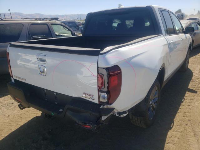 Photo 4 from auction – 2021 HONDA RIDGELINE with VIN 5FPYK3F18MB021904