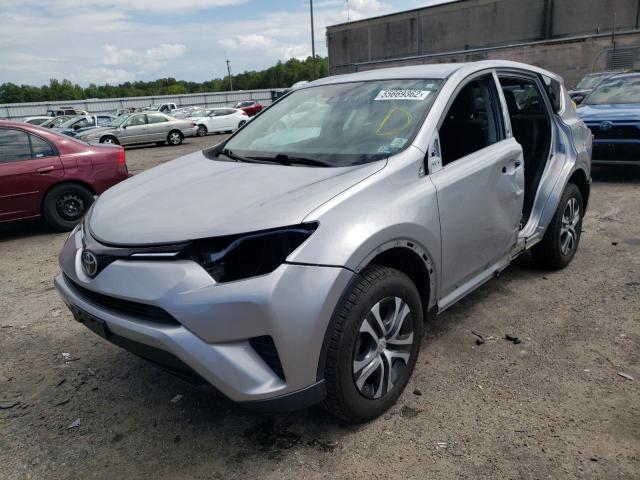Photo 2 from auction – 2018 TOYOTA RAV4 LE with VIN 2T3BFREV6JW697705