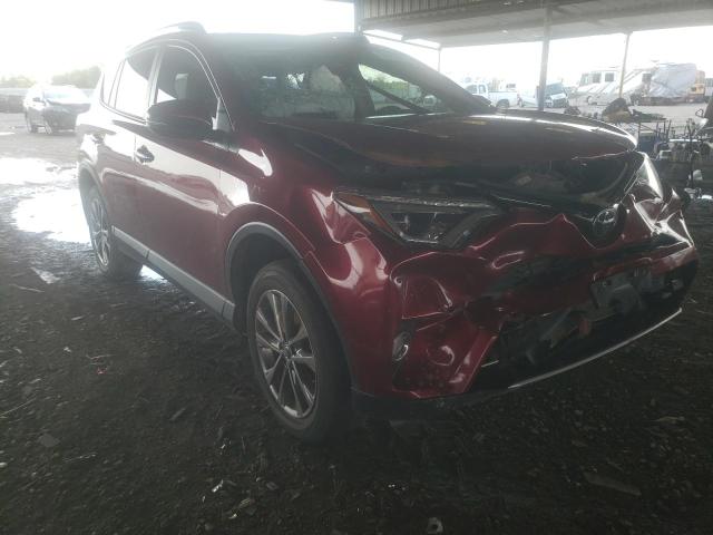Photo 1 from auction – 2018 TOYOTA RAV4 LIMIT with VIN JTMYFREV6JD119871