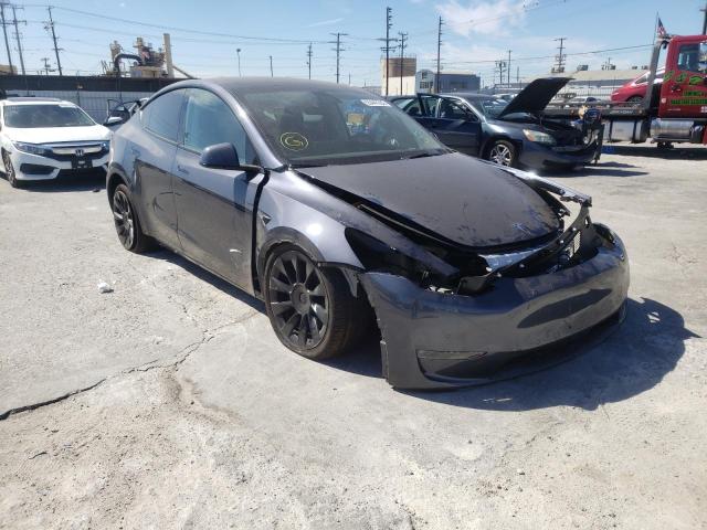 TESLA MODEL Y 2022 with VIN 7SAYGDEE4NF371071 - Photo from auction
