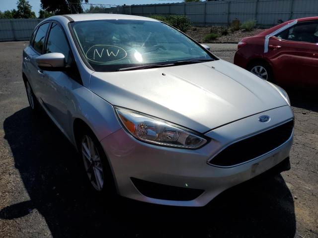 FORD FOCUS SE 2016 with VIN 1FADP3K2XGL336833 - Photo from auction