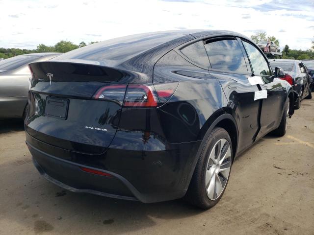 Photo 4 from auction – 2022 TESLA MODEL Y with VIN 7SAYGAEE7NF454668
