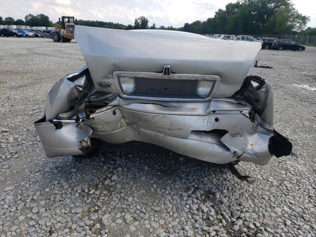 Photo 9 from auction – 2004 LINCOLN TOWN CAR E with VIN 1LNHM81W84Y636158