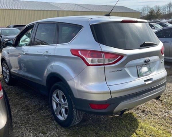 Photo 3 from auction – 2014 FORD ESCAPE SE with VIN 1FMCU0G99EUD58943