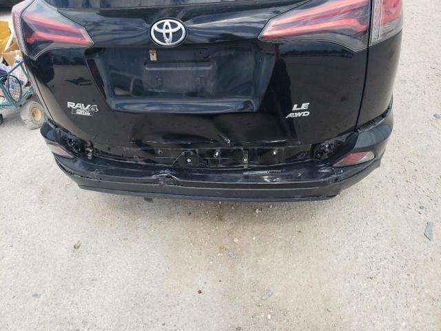 Photo 9 from auction – 2018 TOYOTA RAV4 LE with VIN 2T3BFREV7JW816023