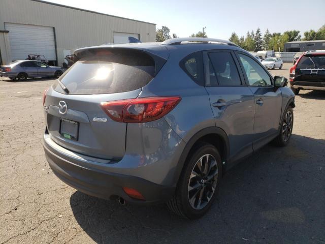 Photo 4 from auction – 2016 MAZDA CX-5 GT with VIN JM3KE4DY3G0678812