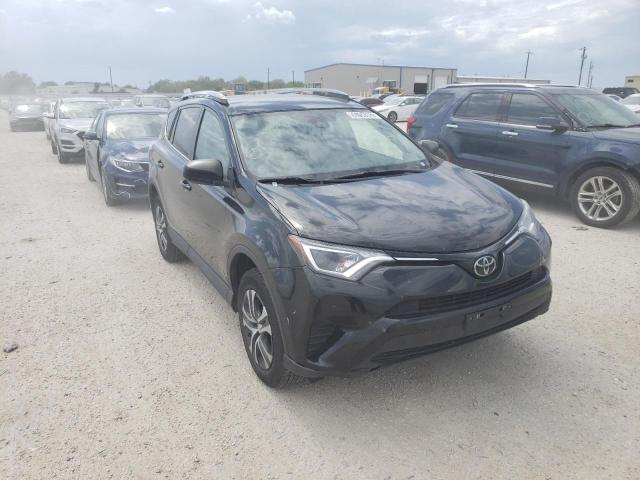 Photo 1 from auction – 2018 TOYOTA RAV4 LE with VIN 2T3BFREV7JW816023