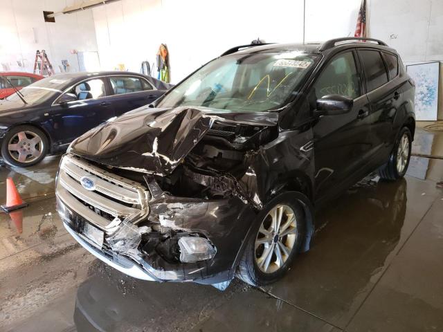 Photo 2 from auction – 2017 FORD ESCAPE SE with VIN 1FMCU9GD2HUB75039