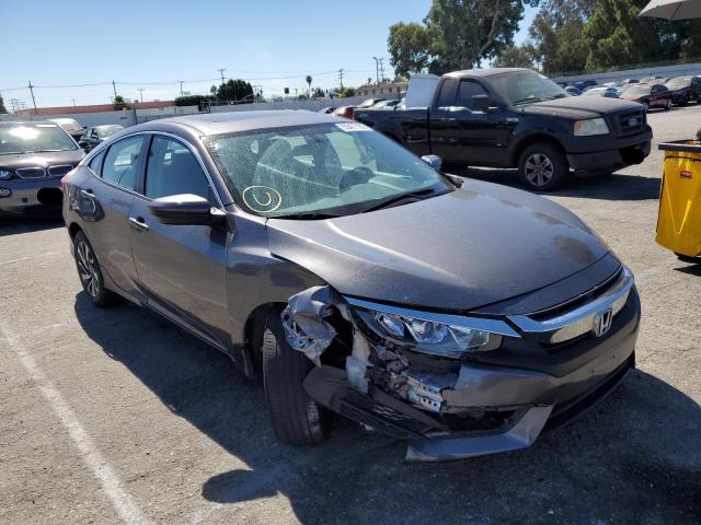 HONDA CIVIC EX 2016 with VIN 2HGFC2F73GH556974 - Photo from auction