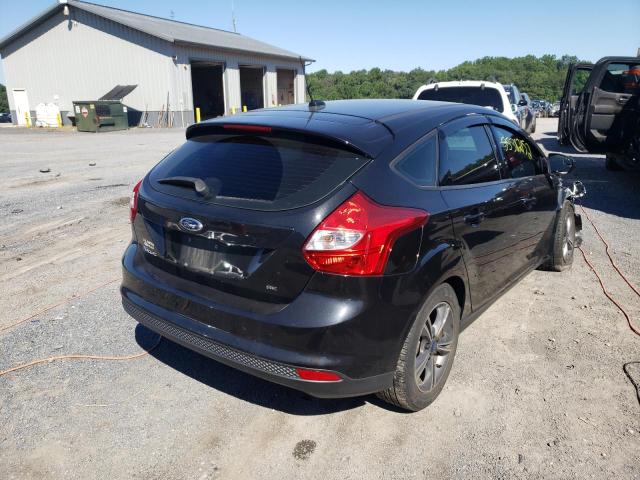 Foto 4 de la subasta – 2014 FORD FOCUS SE con VIN 1FADP3K29EL446608