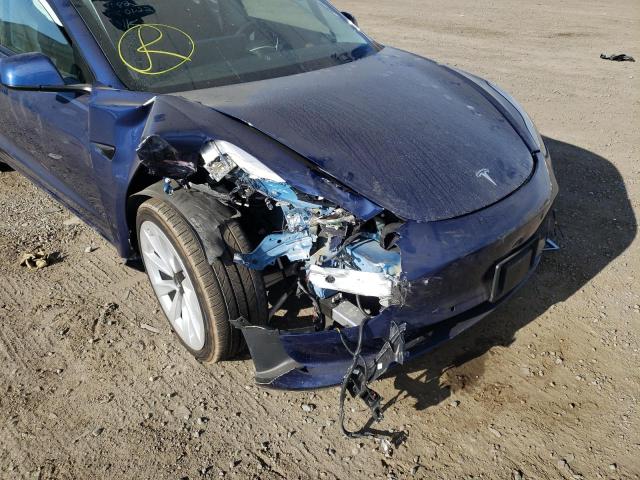 Photo 9 from auction – 2022 TESLA MODEL 3 with VIN 5YJ3E1EA8NF145477