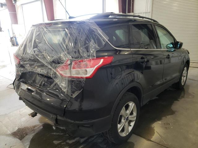 Photo 4 from auction – 2014 FORD ESCAPE SE with VIN 1FMCU9G98EUE40635