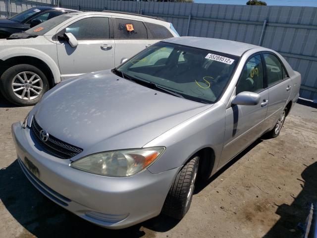 Photo 2 from auction – 2004 TOYOTA CAMRY LE with VIN 4T1BF30K44U077538