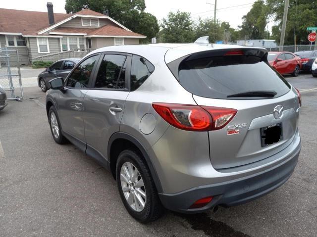Photo 3 from auction – 2013 MAZDA CX-5 SPORT with VIN JM3KE2BEXD0154033