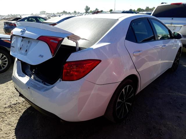 Photo 4 from auction – 2017 TOYOTA COROLLA L with VIN 5YFBURHE9HP696196