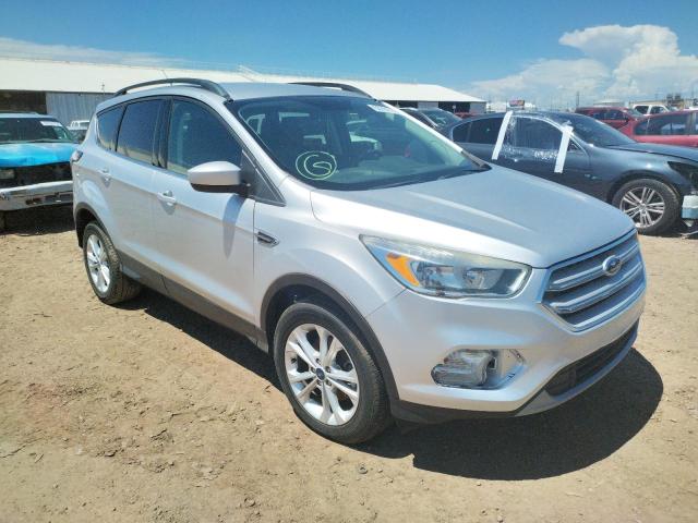 FORD ESCAPE SE 2018 with VIN 1FMCU0GD3JUA73752 - Photo from auction