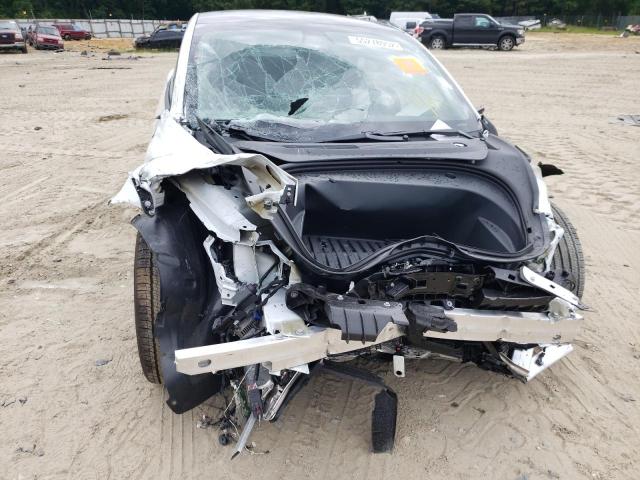 Photo 9 from auction – 2021 TESLA MODEL 3 with VIN 5YJ3E1EA9MF062106
