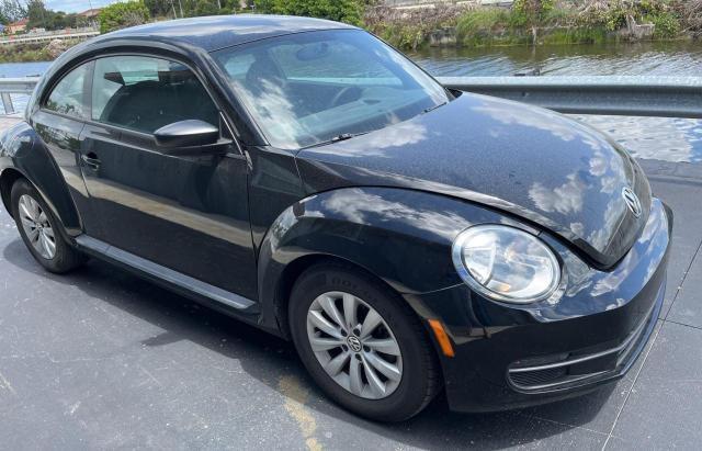 VOLKSWAGEN BEETLE 2013 with VIN 3VWFP7AT4DM688947 - Photo from auction