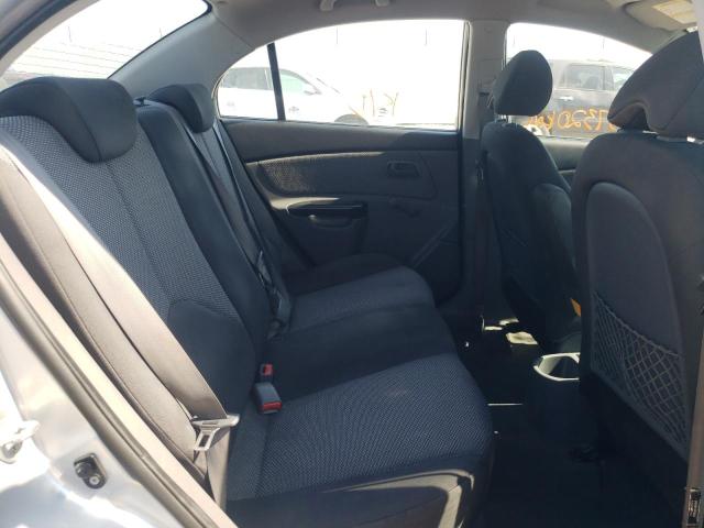 Photo 6 from auction – 2010 KIA RIO LX with VIN KNADH4B3XA6606460