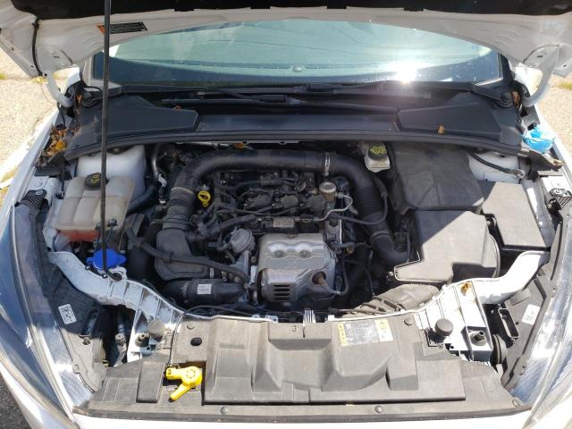Foto 7 de la subasta – 2018 FORD FOCUS SE con VIN 1FADP3FE1JL210064