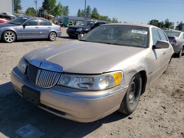Photo 2 from auction – 1998 LINCOLN TOWN CAR E with VIN 1LNFM81W3WY655856
