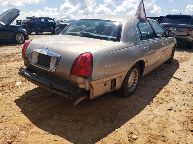 Photo 4 from auction – 2000 LINCOLN TOWN CAR E with VIN 1LNHM81W1YY864086