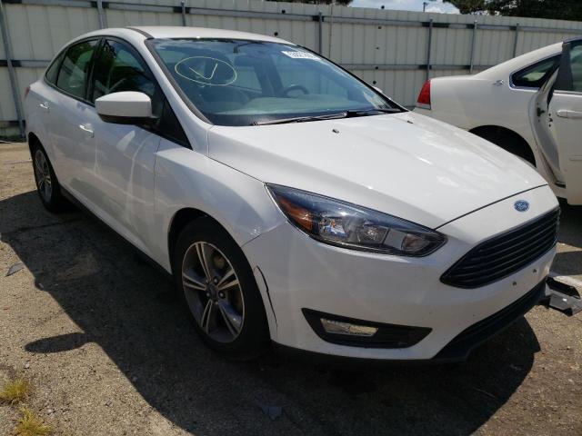 FORD FOCUS SE 2018 with VIN 1FADP3FE1JL210064 - Photo from auction