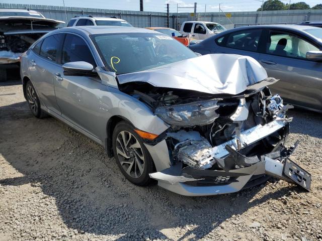 HONDA CIVIC EX 2018 with VIN 19XFC2F71JE020932 - Photo from auction