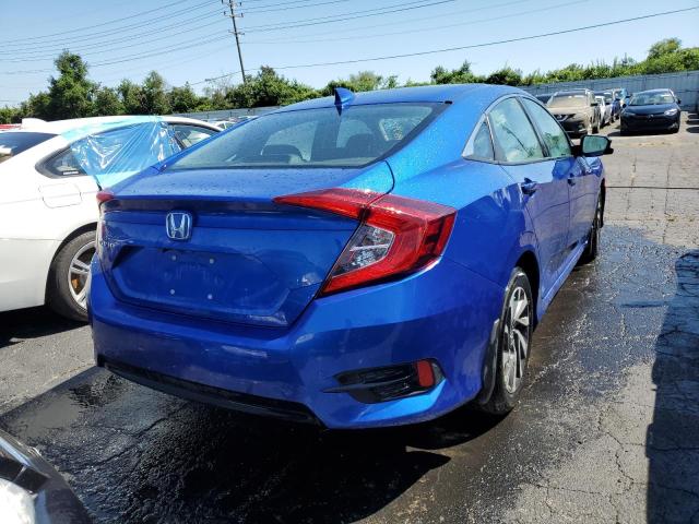 Photo 4 from auction – 2018 HONDA CIVIC EX with VIN 19XFC2F72JE035097