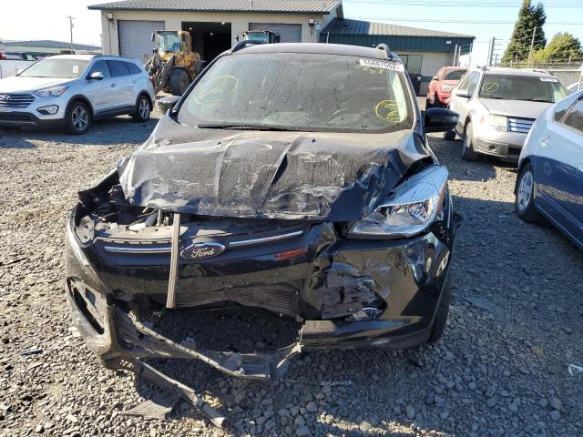 Photo 9 from auction – 2016 FORD ESCAPE SE with VIN 1FMCU9G90GUC60715