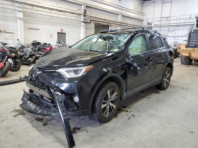Photo 2 from auction – 2017 TOYOTA RAV4 XLE with VIN 2T3RFREV4HW592945
