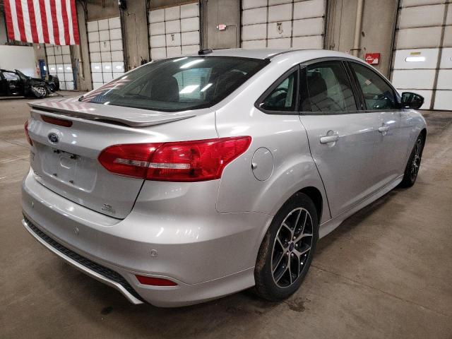 Photo 4 from auction – 2015 FORD FOCUS SE with VIN 1FADP3FE3FL385620