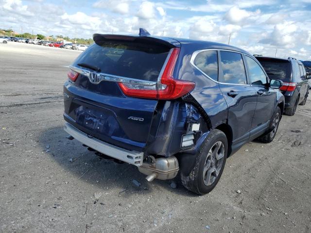 Photo 4 from auction – 2018 HONDA CR-V EXL with VIN 7FARW2H87JE083512