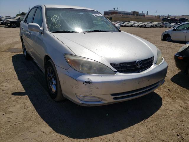 TOYOTA CAMRY LE 2002 with VIN 4T1BE32K12U075887 - Photo from auction